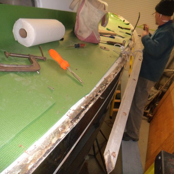 Great Eagle, aged & tired toerails being removed Great Eagle, aged & tired toerails being removed