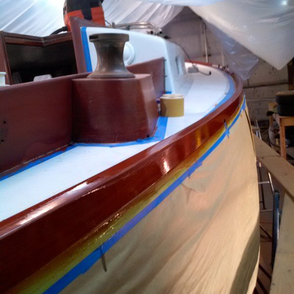 Great Eagle, new toerail stained to match other brightwork and varnish build-up Great Eagle, new toerail stained to match other brightwork and varnish build-up