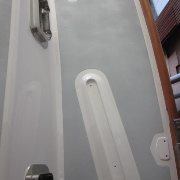 New non-skid and smooth painted surfaces at repaired genoa track area stbd New non-skid and smooth painted surfaces at repaired genoa track area stbd